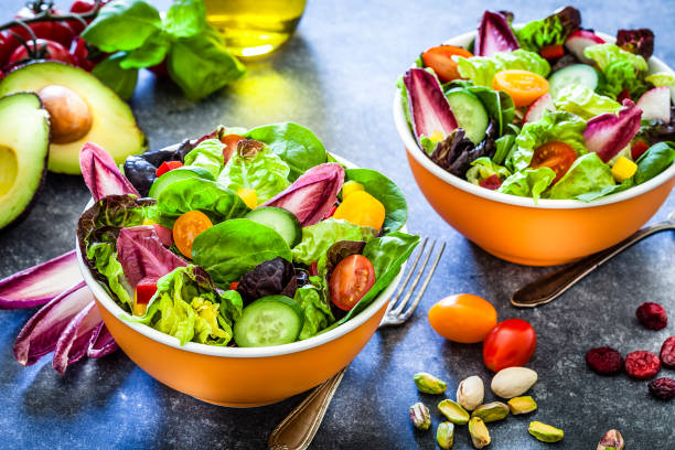 istock Healthy eating: two fresh salad bowls ready to eat 1152601360
