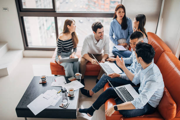 istock Group of friends working together 1152601377