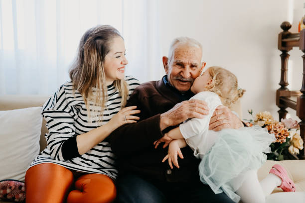 istock Family gathering at sofa 1152601809