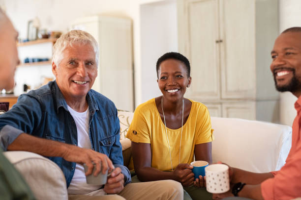 istock Group of mature friends talking 1152602621