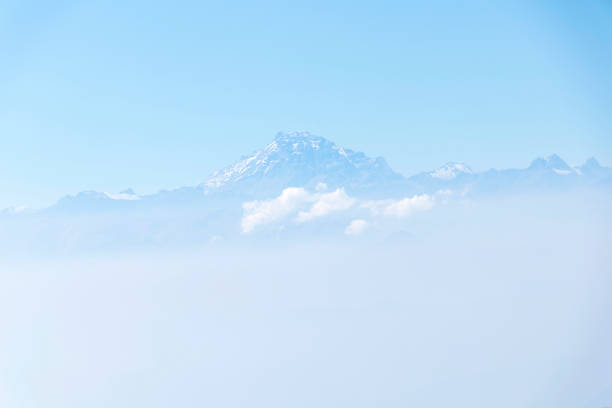 istock Abstract cascade mountain chains silhouette landscape nackground in a light blue mist sky in morning Andes 1152603384