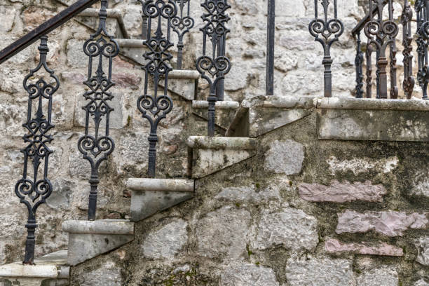 istock Old stone stairs with wrought iron railings 1152604522