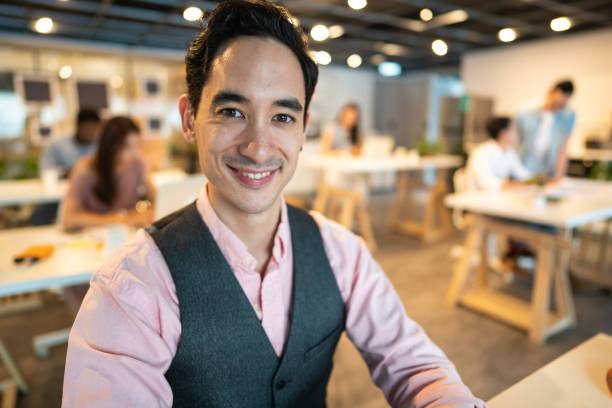 istock Portrait of hearing impaired man at work 1152605595