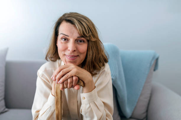 istock Elderly woman smiling at home 1152605620