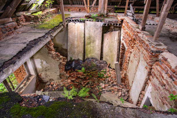 istock Destroyed roof of an abandoned building 1152606661