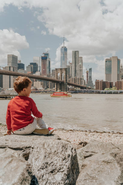 istock Boy playing in the Brooklyn Bridge Park, New York 1152606668