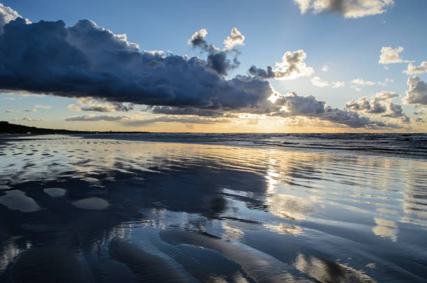 istock Sunset on the beach with cloudy sky, Baltic sea, Jurmala, Latvia 1152607036