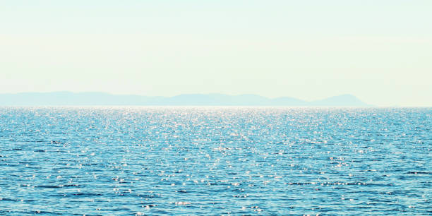 istock Sea and mountain range. Summer seascape horizon. 1152607124