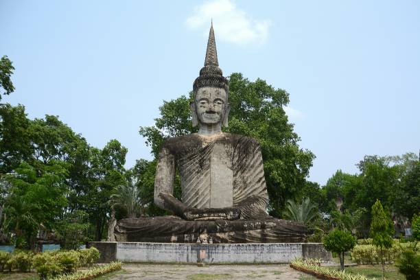 Buddha statue at Sala Keoku, Nong Khai, Thailand Buddha image at Sala Keoku (wat Khaek) in Nong Khai, a park featuring giant fantastic concrete sculptures inspired by Buddhism and Hinduism. It is located in immediate proximity of the Thai-Lao border and the Mekong river. Thailand nong khai province stock pictures, royalty-free photos & images