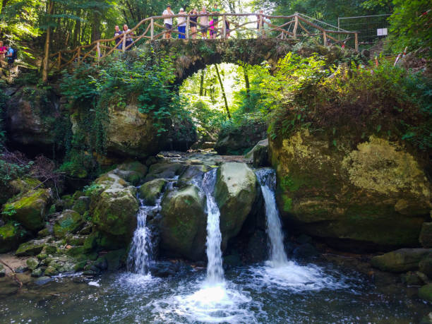Schiessentmpel or Schissendmpel Waterfall in Mullerthal, Luxembourg.