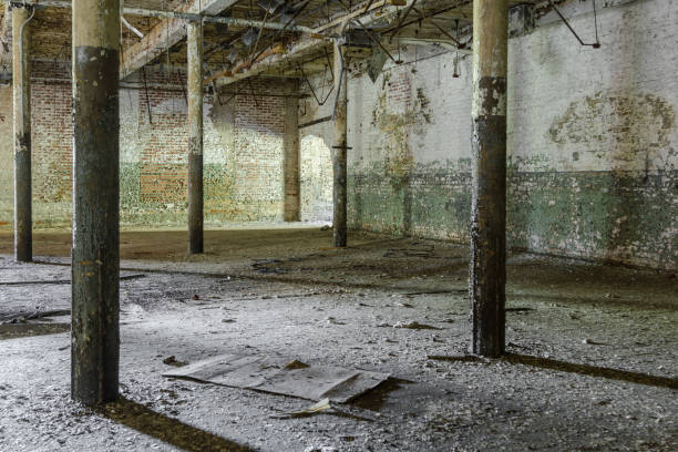 istock Various support beams left forgotten in an abandoned factory 1152611383