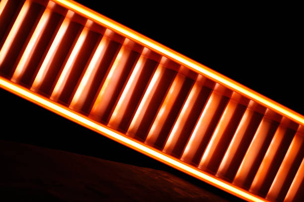 istock Stairway with orange and yellow lights along steps creating a vector illustration 1152613259