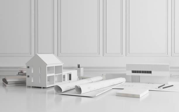 istock Mock-up of architectural construction drawing paper with white building model,Rolls of blueprint - 3D rendering 1152613873