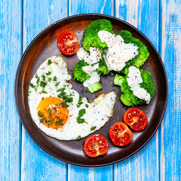 Breakfast - fried egg with vegetables
