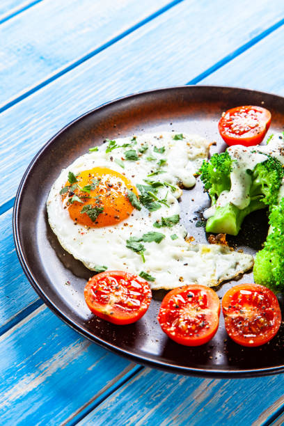 Breakfast - fried egg with vegetables