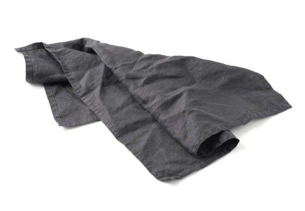 istock Black linen napkin isolated on white 1152620996