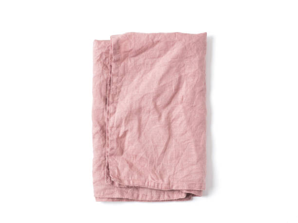 istock Pink linen napkin isolated on white 1152621044