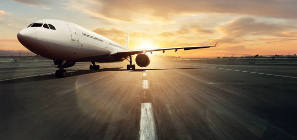istock Front view of commercial airplane on runway 1152622851