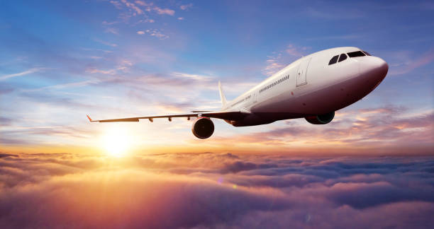 istock Passengers commercial airplane flying above clouds 1152622908