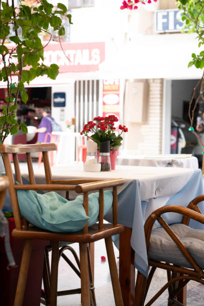 istock cafe place, flower pot on table 1152625227
