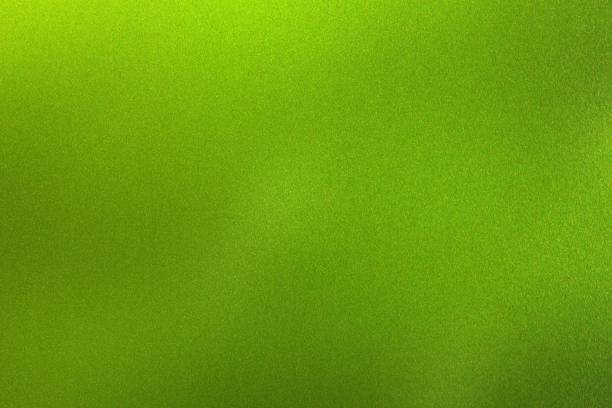 istock Glowing polished green wave metallic wall, abstract texture background 1152627598