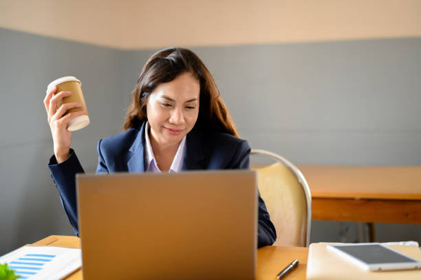 istock Working women sitting at the office desk 1152629635