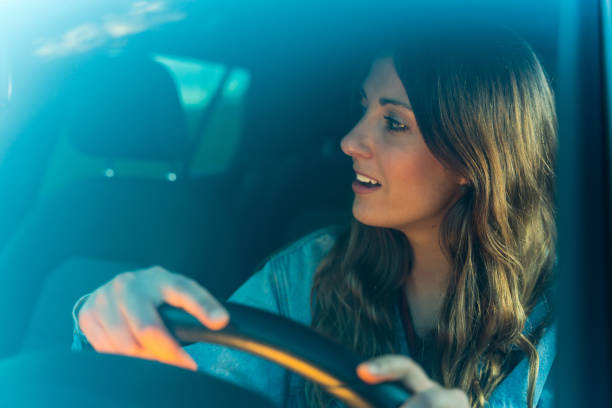 istock Young woman driving a car 1152633221