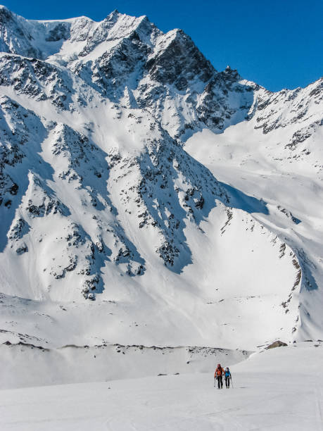 istock Winter mountain adventure. Man on a trail 1152636435