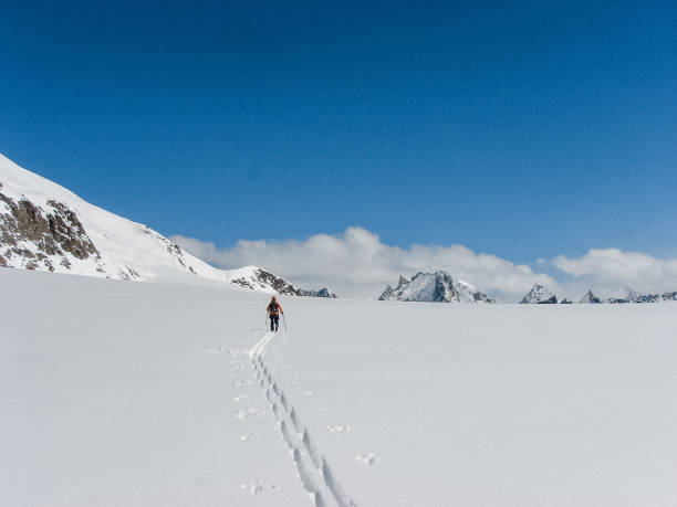 istock Winter mountain adventure. Man on a trail 1152636497