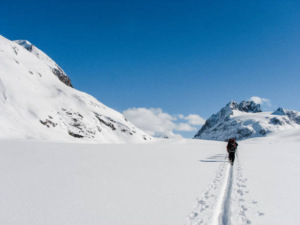 istock Winter mountain adventure. Man on a trail 1152636535
