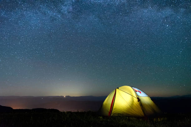 istock tourist tent against the night sky 1152636548