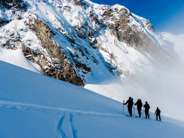 istock Winter mountain adventure. Man on a trail 1152636561