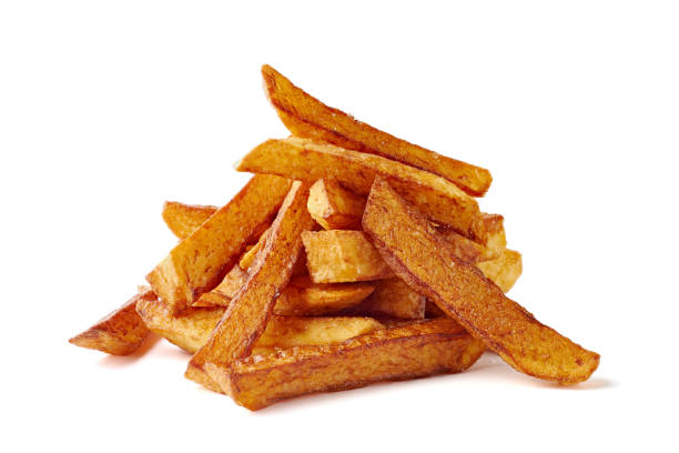 Heap of french fries on white background stock photo