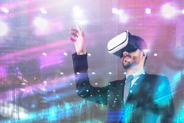 istock Man in suit using VR headset in night city 1152640115