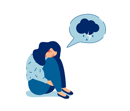 Young sad girl sitting and unhappy hugging her knees and cry. Woman in depression with gloomy thoughts in speech bubble