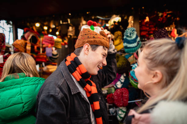 istock Young Man Wearing a Novelty Christmas Hat 1152645900