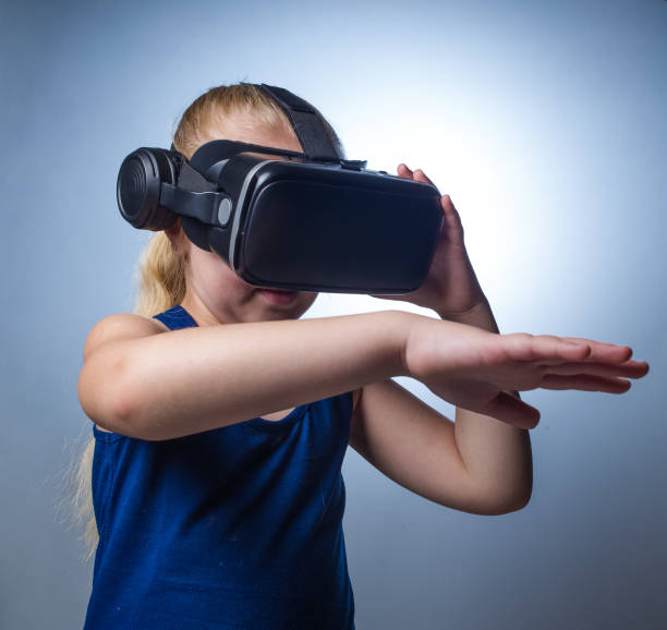 istock Close up image of a young toddler girl using a VR / Virtual Reality headset 1152647002