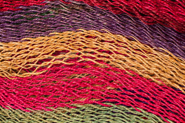 Raffia texture in a close up view Colored raffia texture in a close up view raffia stock pictures, royalty-free photos & images