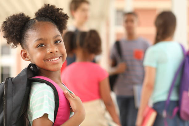 istock African descent, elementary age girl on school campus. 1152647649