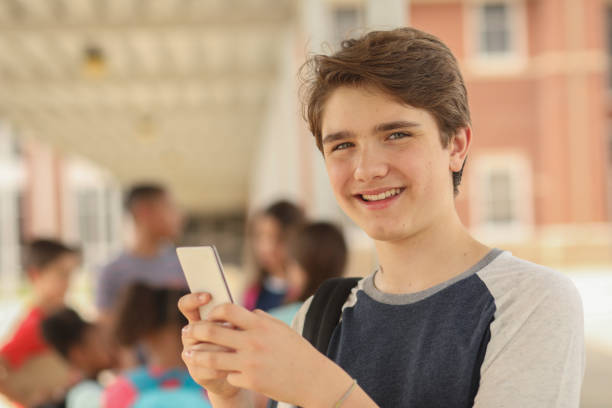 istock Latin descent, junior high age boy on school campus. 1152649746