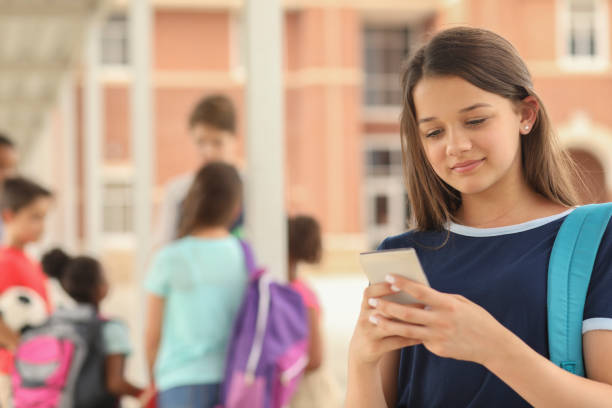 istock Latin descent, high school age girl on school campus. 1152649820