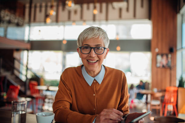 istock Business woman holding digital tablet 1152650053