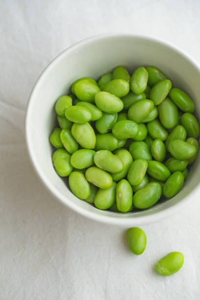 istock Edamame beans on bowl on a table 1152650631