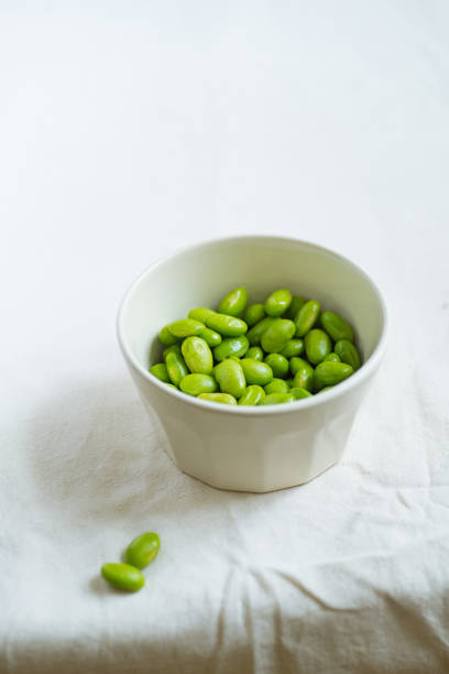istock Edamame beans on bowl on a table 1152650634
