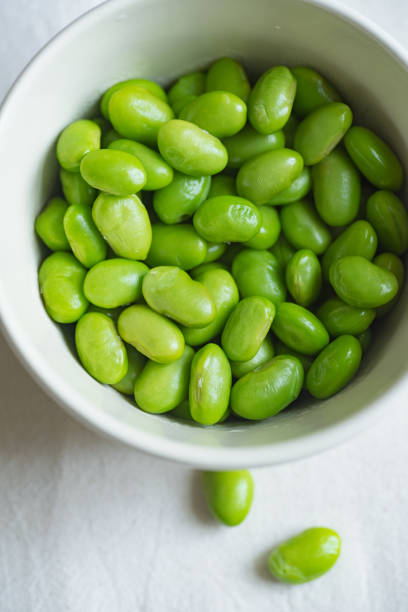 istock Edamame beans on bowl on a table 1152650639