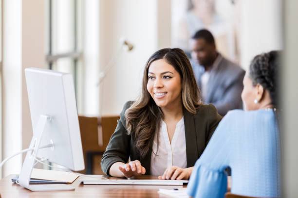 istock A bank manager and customer look at interest rates 1152654629
