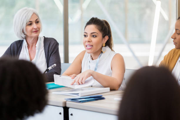 istock Hispanic American woman points out policy issures 1152654632