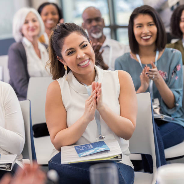 istock Audience claps at conclusion of presentation 1152654638
