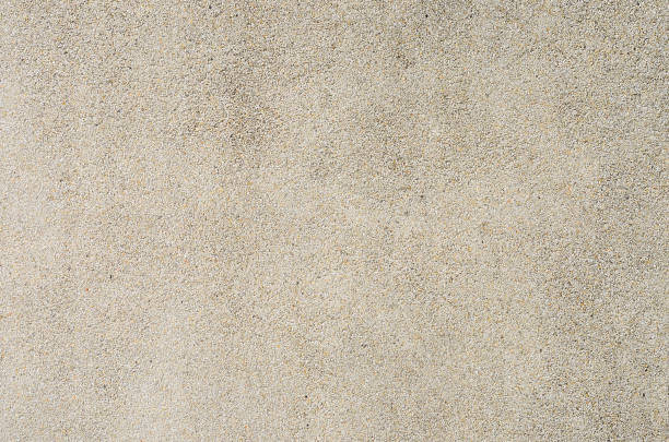 lumière seasand sandwash, fond, texture. - pebble sand photos et images de collection