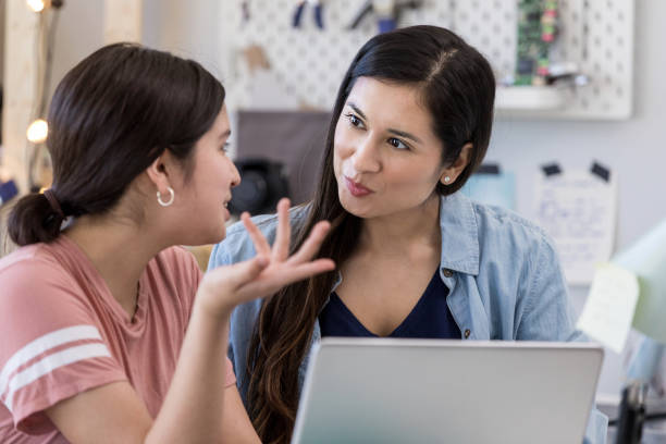 istock Native American mother listens to daughter's explanation 1152654968